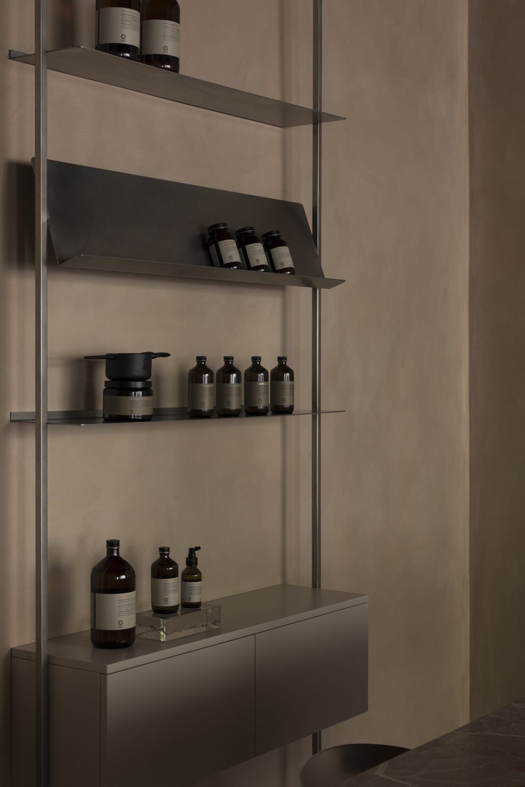 Considered botanical products on a shelf inside Éthos