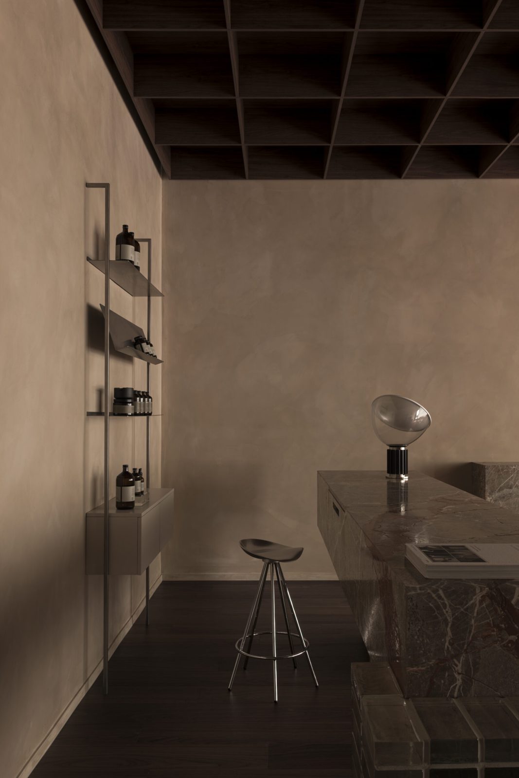 Walnut floors, caramel plaster walls and a coffered acoustic ceiling