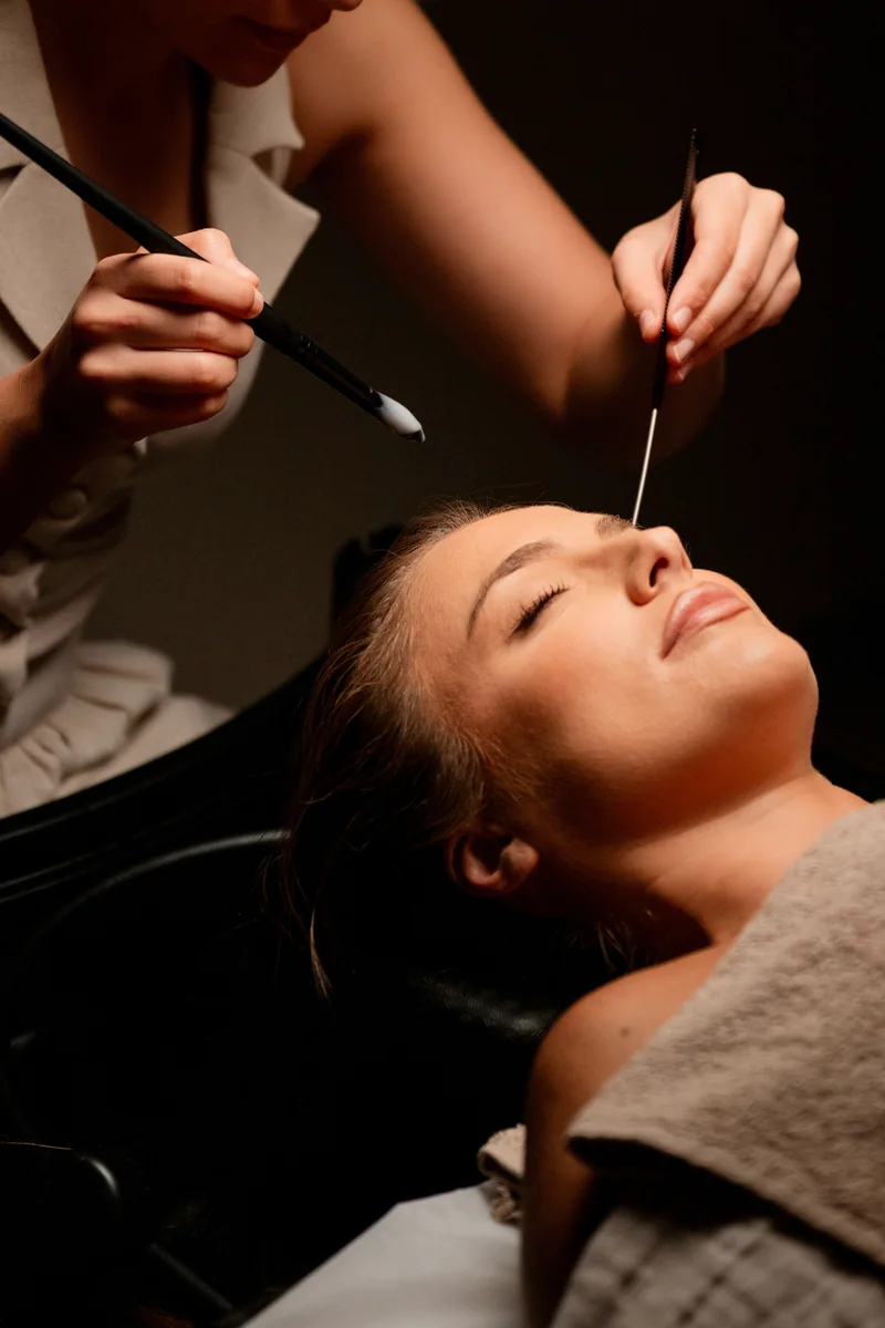 A guest receiving the Éthos Strengthening Head Spa treatment