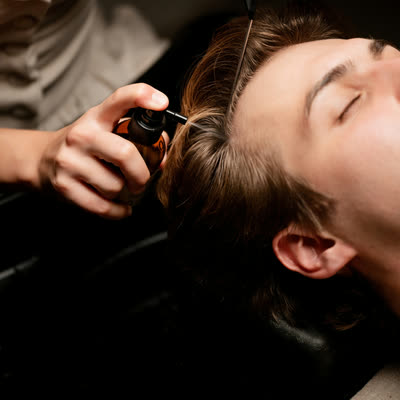 We perform an in-clinic scalp treatment in our Brighton clinic